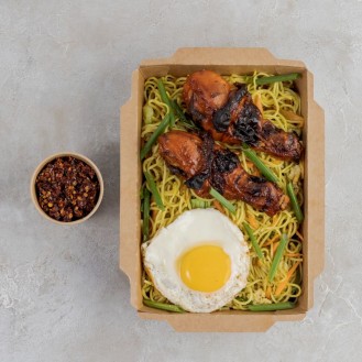 Egg and vegetable fried noodles with BBQ chicken and Fried Egg