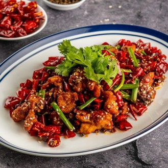Wok-Fried Chicken Cubes With Coriander And Chili Oil 